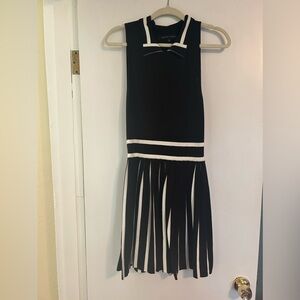 Black and white knit sleeveless sweater dress